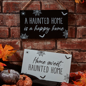 Haunted home hanging plaque … 2 styles