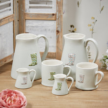 Load image into Gallery viewer, Spring floral welly milk jug … 2 colours