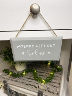 Nobody gets out sober plaque