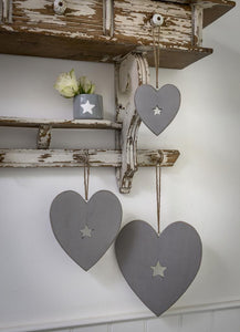 Hanging hearts with carved star detail ... Grey