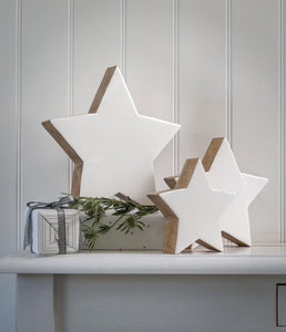 White & wood mantel stars