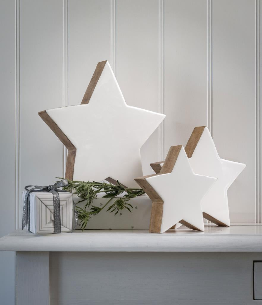 White & wood mantel stars