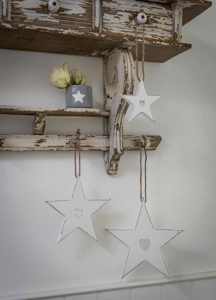 Hanging stars with carved heart detail ... white