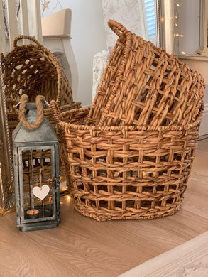 Oval braided baskets ....  set of 2